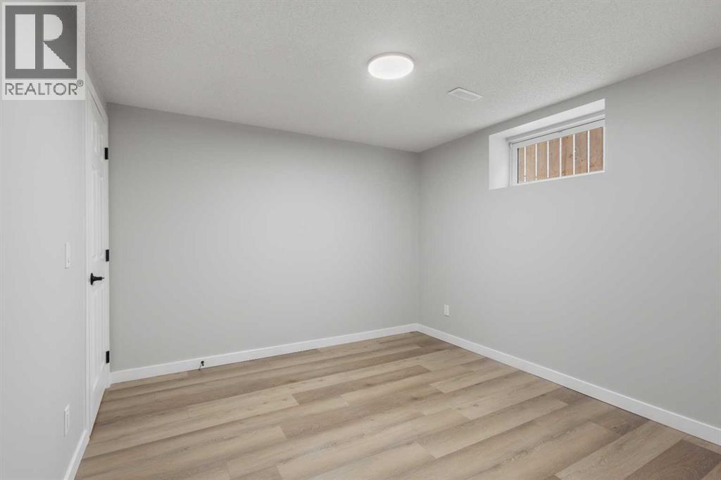 7512 Hunterfield Road Nw, Calgary, Alberta  T2K 4L1 - Photo 27 - A2275257