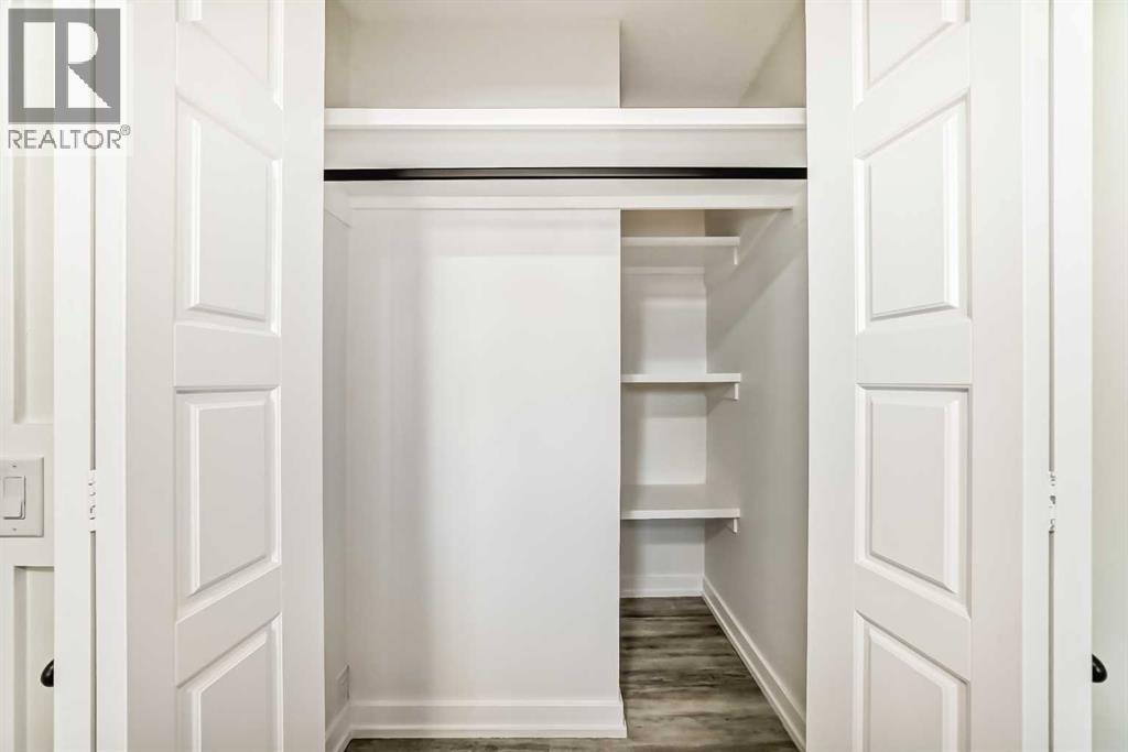 946 Berkley Drive Nw, Calgary, Alberta  T3K 1A2 - Photo 22 - A2264876