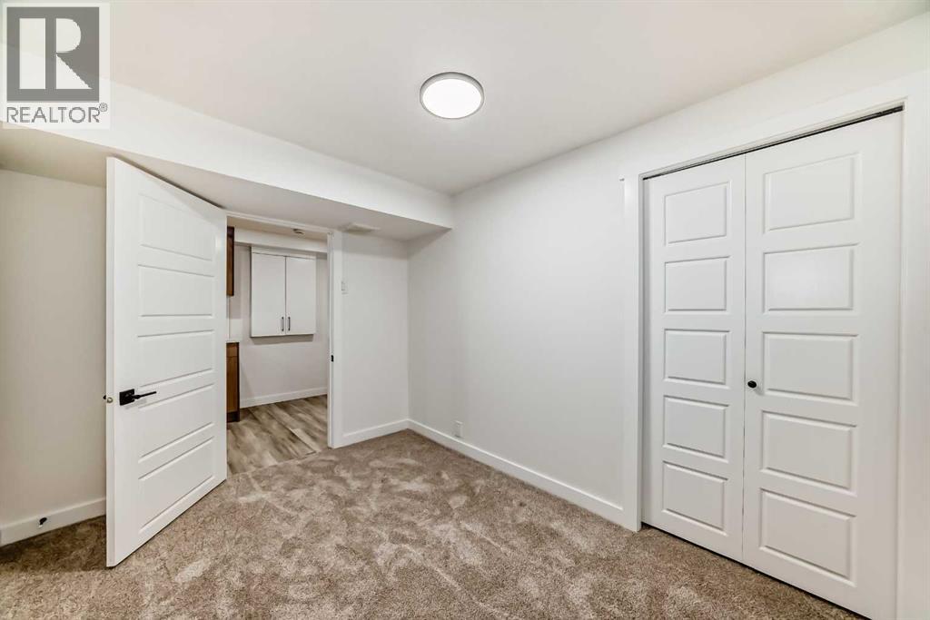 946 Berkley Drive Nw, Calgary, Alberta  T3K 1A2 - Photo 40 - A2264876