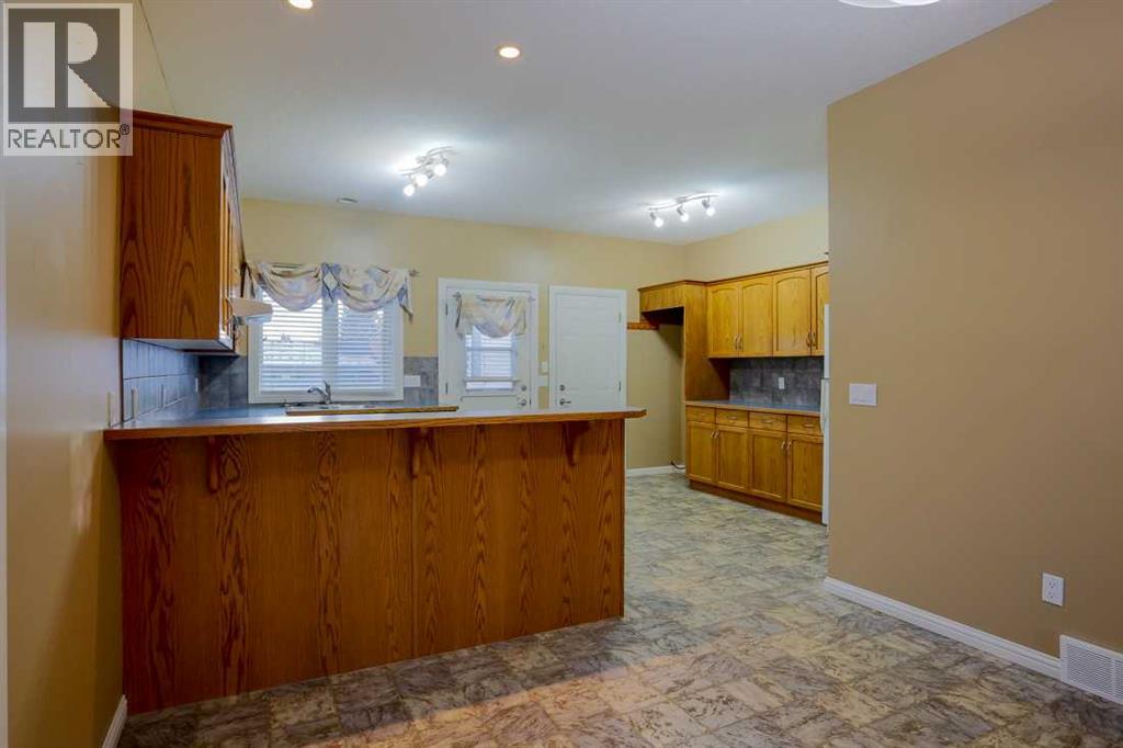 1105 Hammond Avenue, Crossfield, Alberta  T0M 0S0 - Photo 5 - A2273201