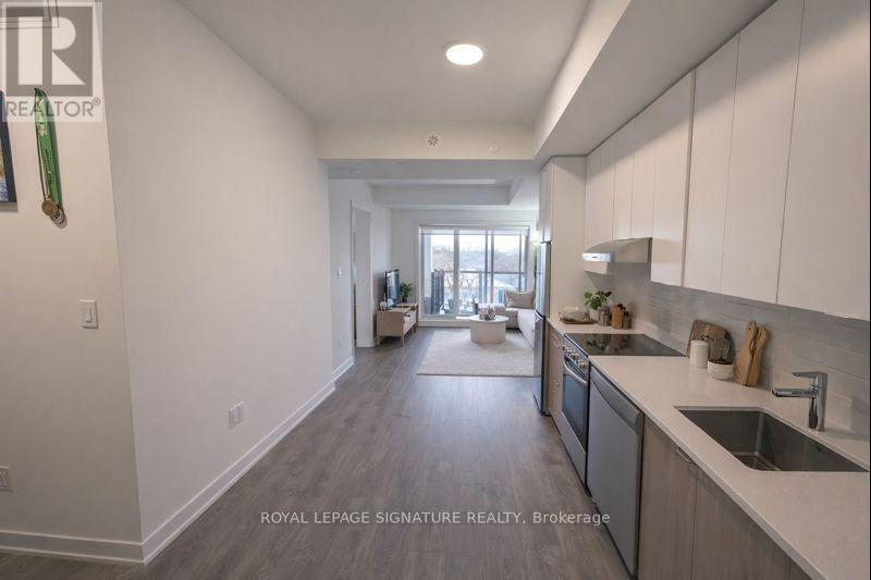 414 - 165 Canon Jackson Drive, Toronto, Ontario  M6M 2G1 - Photo 2 - W12615290