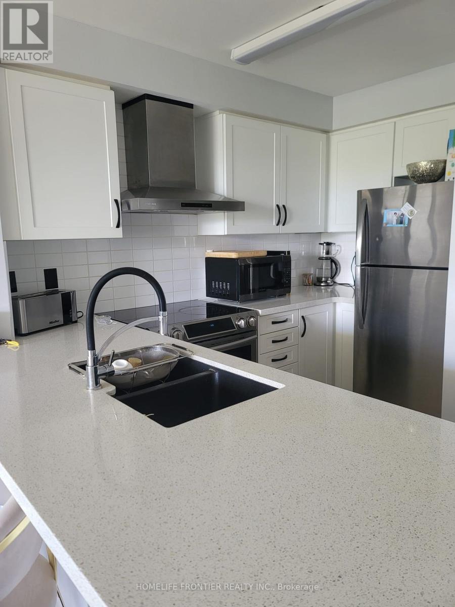 217 - 310 Red Maple Road, Richmond Hill, Ontario  L4C 0T7 - Photo 2 - N12651614