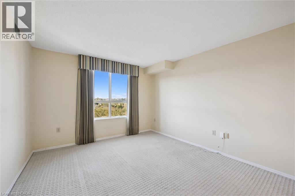 30 Blue Springs Drive Unit# 702, Waterloo, Ontario  N2J 4T2 - Photo 21 - 40777462