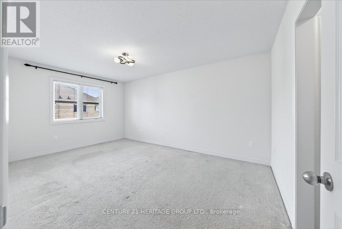 13 Mclaughlin Avenue, Milton, Ontario  L9T 8K2 - Photo 22 - W12652074