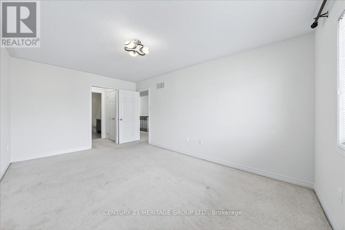 13 Mclaughlin Avenue, Milton, Ontario  L9T 8K2 - Photo 23 - W12652074