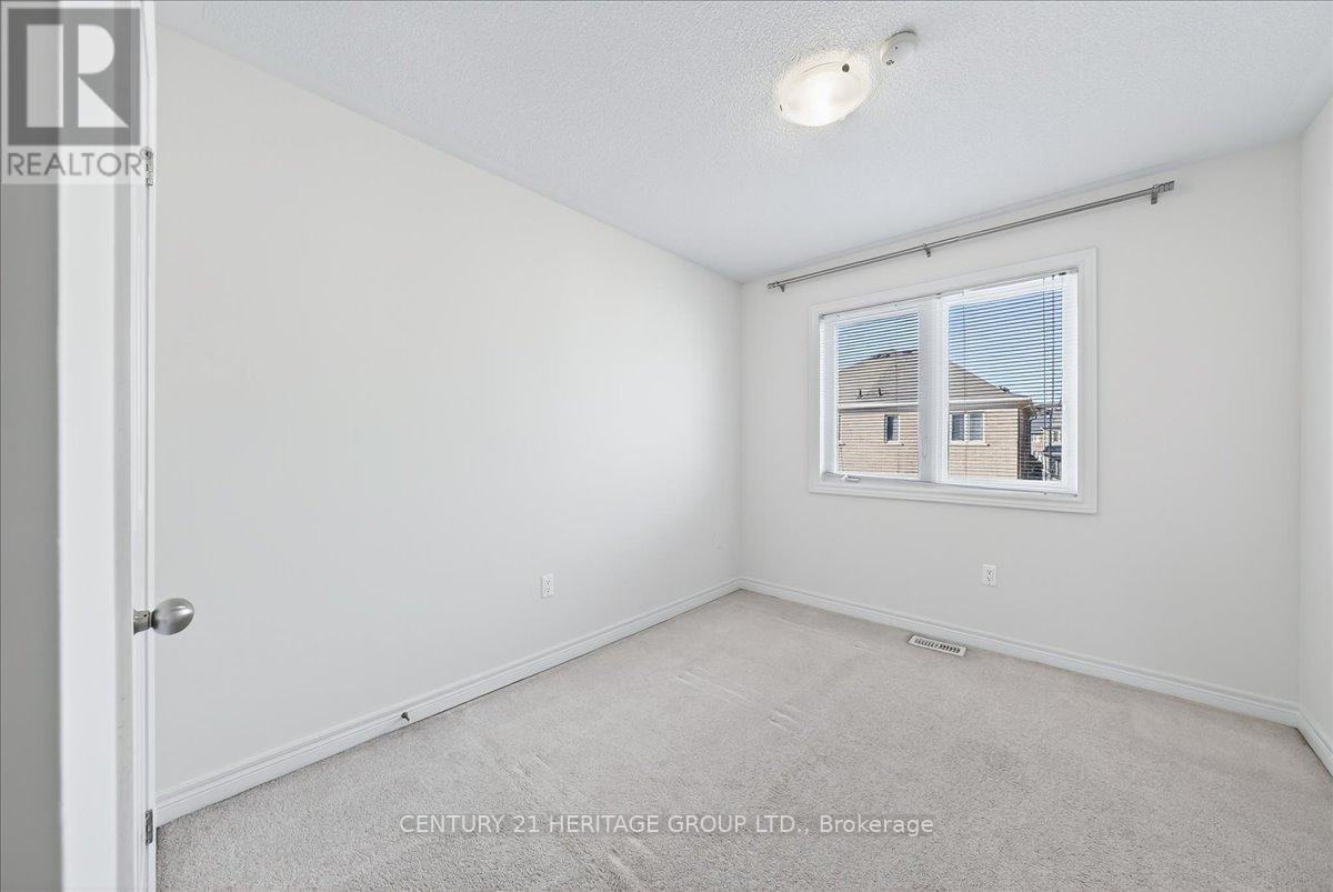 13 Mclaughlin Avenue, Milton, Ontario  L9T 8K2 - Photo 27 - W12652074