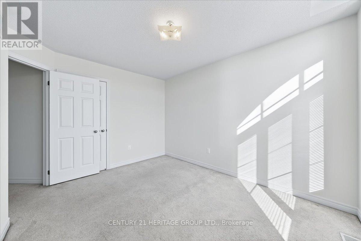 13 Mclaughlin Avenue, Milton, Ontario  L9T 8K2 - Photo 35 - W12652074