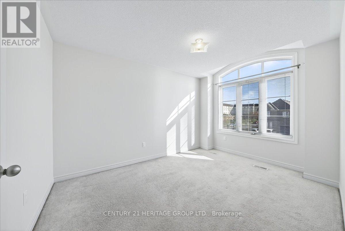 13 Mclaughlin Avenue, Milton, Ontario  L9T 8K2 - Photo 36 - W12652074