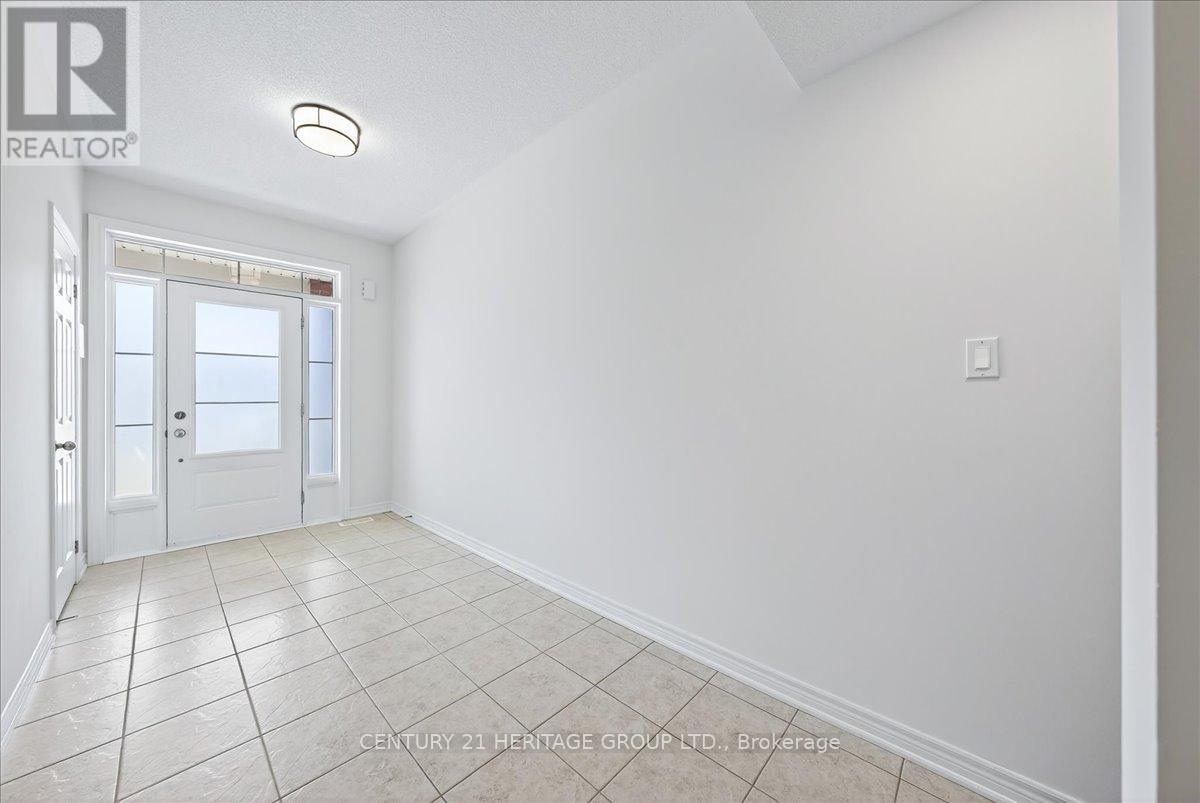 13 Mclaughlin Avenue, Milton, Ontario  L9T 8K2 - Photo 6 - W12652074