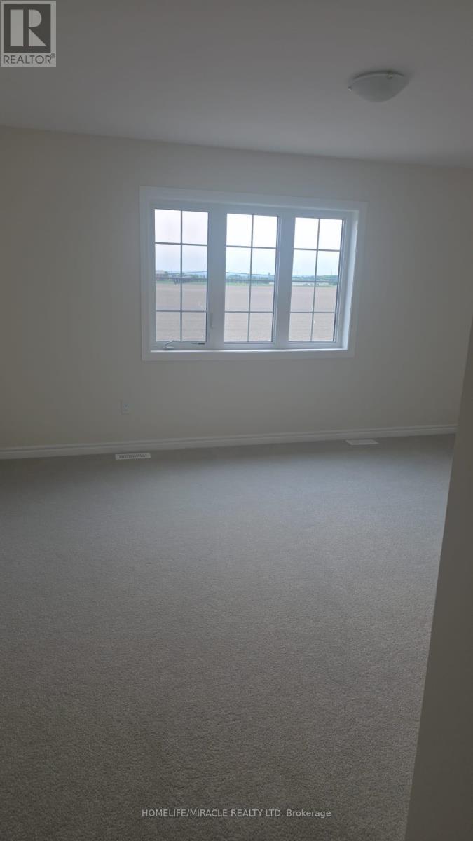 33 Fenn Crescent, New Tecumseth, Ontario  L9R 0X3 - Photo 7 - N12652246