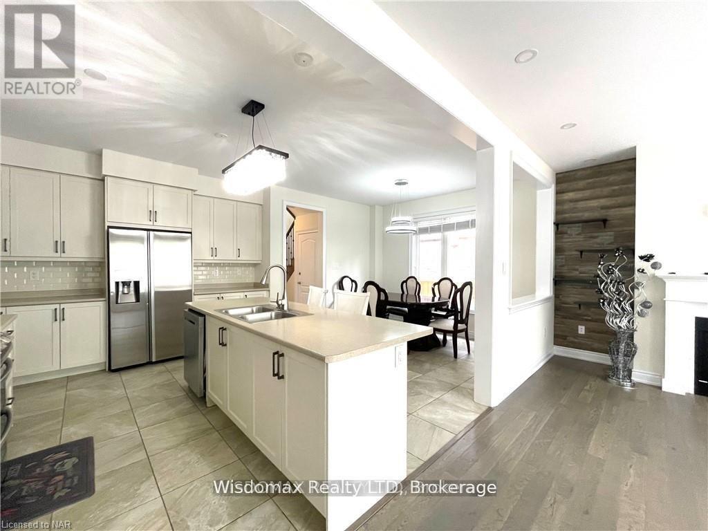 Mainfloor - 7729 Hackberry Trail N, Niagara Falls, Ontario  L2H 3R5 - Photo 4 - X12652522