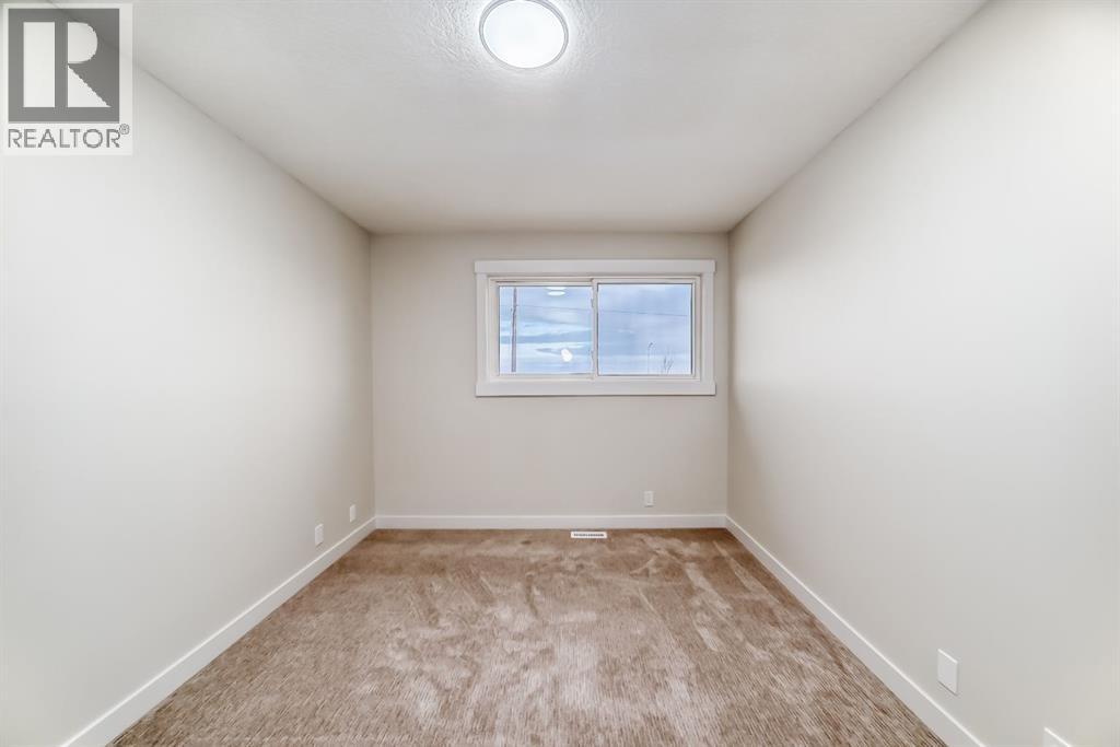 100 Beddington Circle Ne, Calgary, Alberta  T3K 1K6 - Photo 18 - A2275507