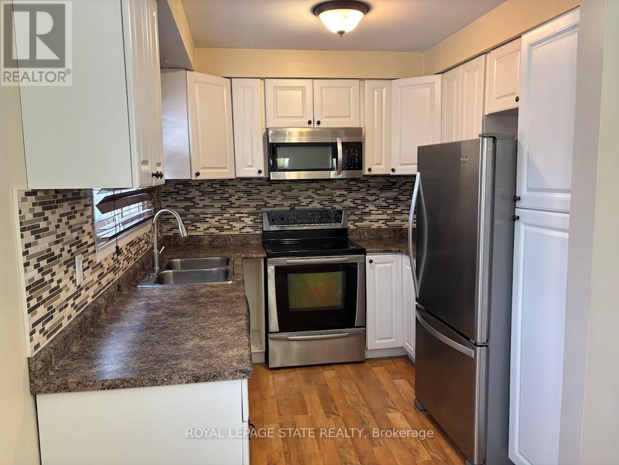 118 - 11 Harrisford Street, Hamilton, Ontario  L8K 6L7 - Photo 3 - X12652836