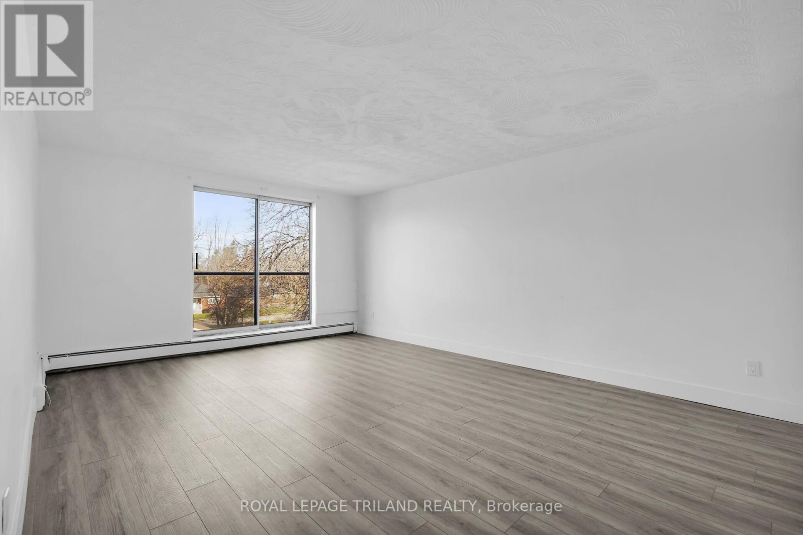 309 - 294 Saulsbury Street, Strathroy-Caradoc (Nw), Ontario  N7G 2B2 - Photo 1 - X12582098