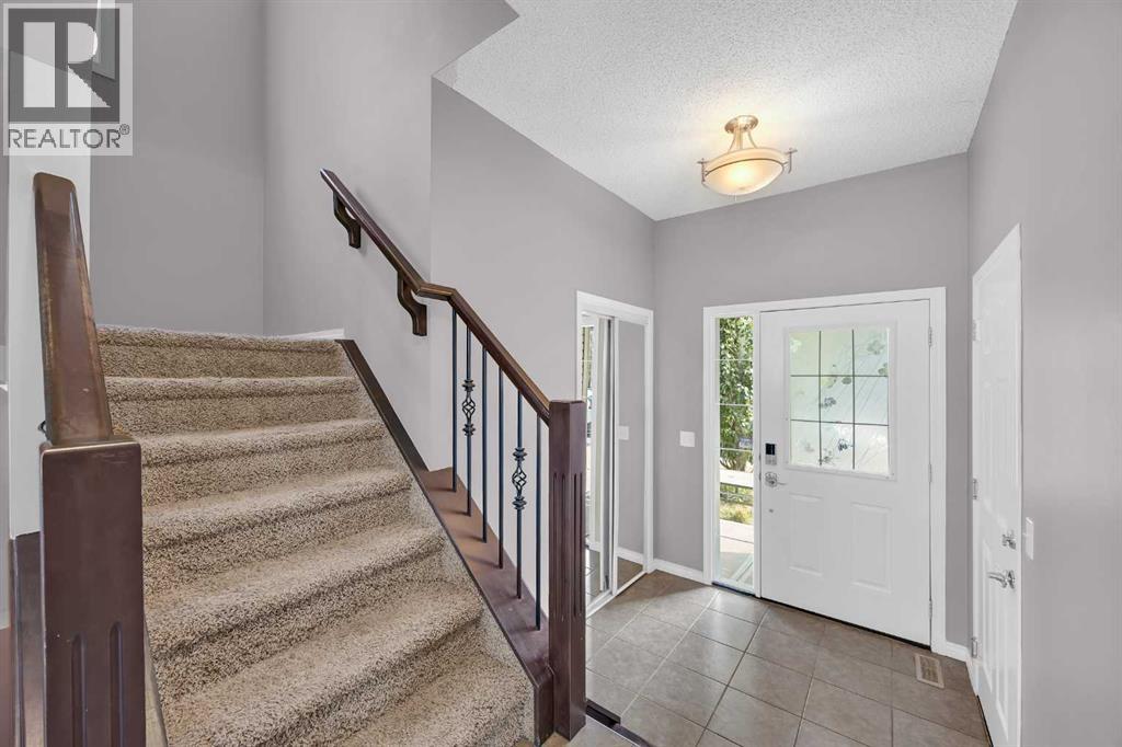 126 Windstone Avenue Sw, Airdrie, Alberta  T4B 3R3 - Photo 4 - A2273795