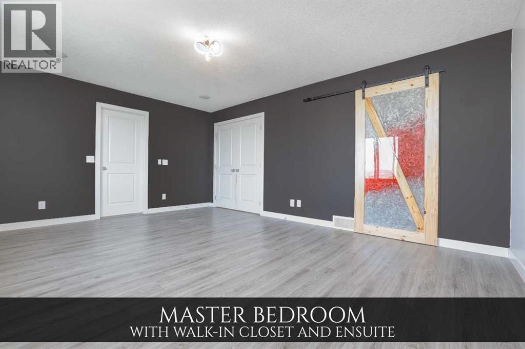 129 Pantego Bay Nw, Calgary, Alberta  T3K 0B7 - Photo 19 - A2255406