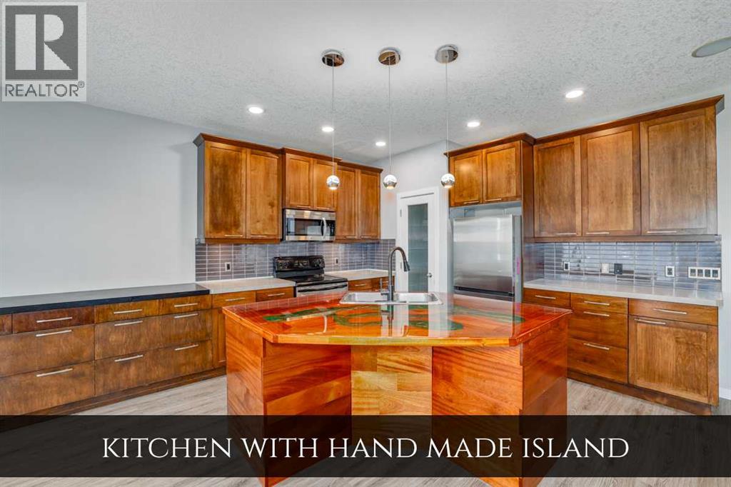 129 Pantego Bay Nw, Calgary, Alberta  T3K 0B7 - Photo 6 - A2255406