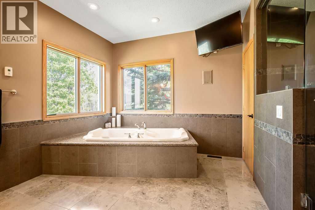 100, 182029 174 Avenue W, Priddis, Alberta  T1S 2B8 - Photo 26 - A2229058