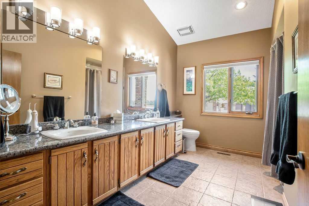 100, 182029 174 Avenue W, Priddis, Alberta  T1S 2B8 - Photo 28 - A2229058