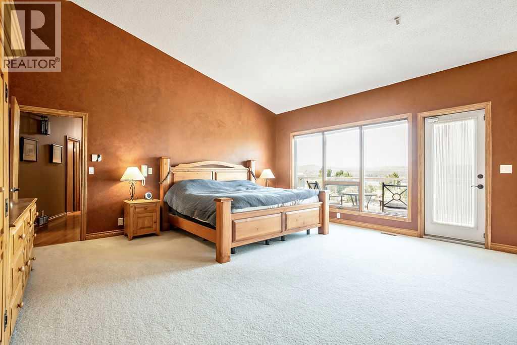 100, 182029 174 Avenue W, Priddis, Alberta  T1S 2B8 - Photo 23 - A2229058