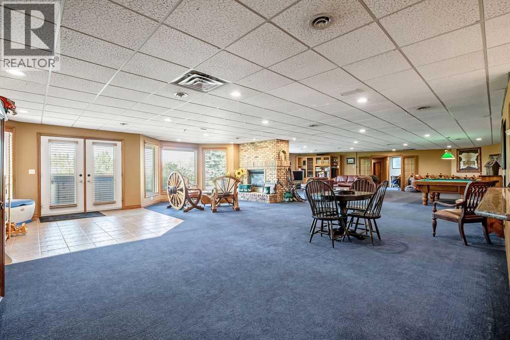 100, 182029 174 Avenue W, Priddis, Alberta  T1S 2B8 - Photo 30 - A2229058