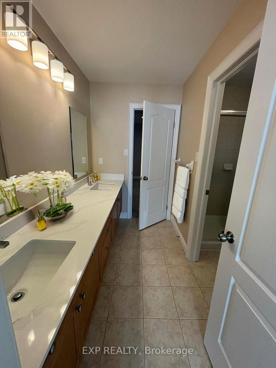 93 Tremaine Drive, Kitchener, Ontario  N2A 4M3 - Photo 4 - X12653348