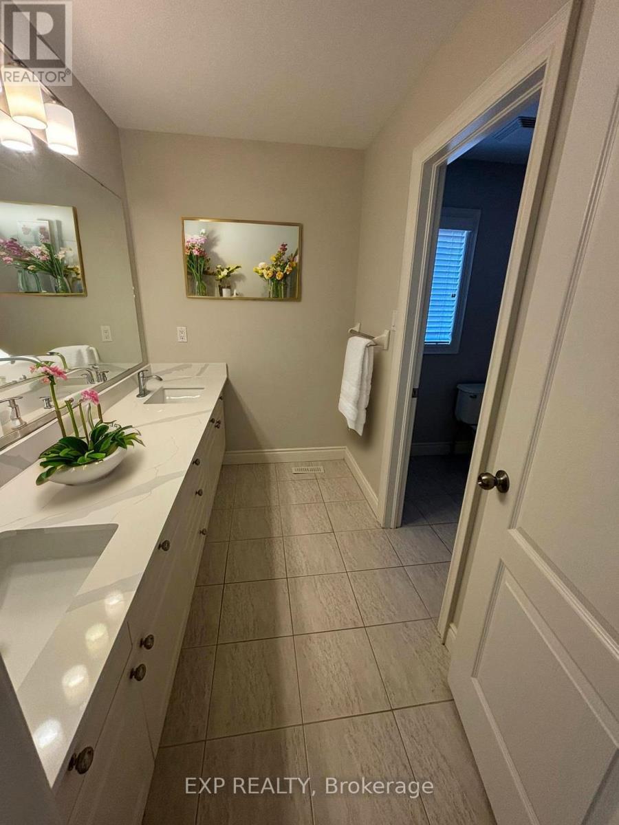 93 Tremaine Drive, Kitchener, Ontario  N2A 4M3 - Photo 5 - X12653348