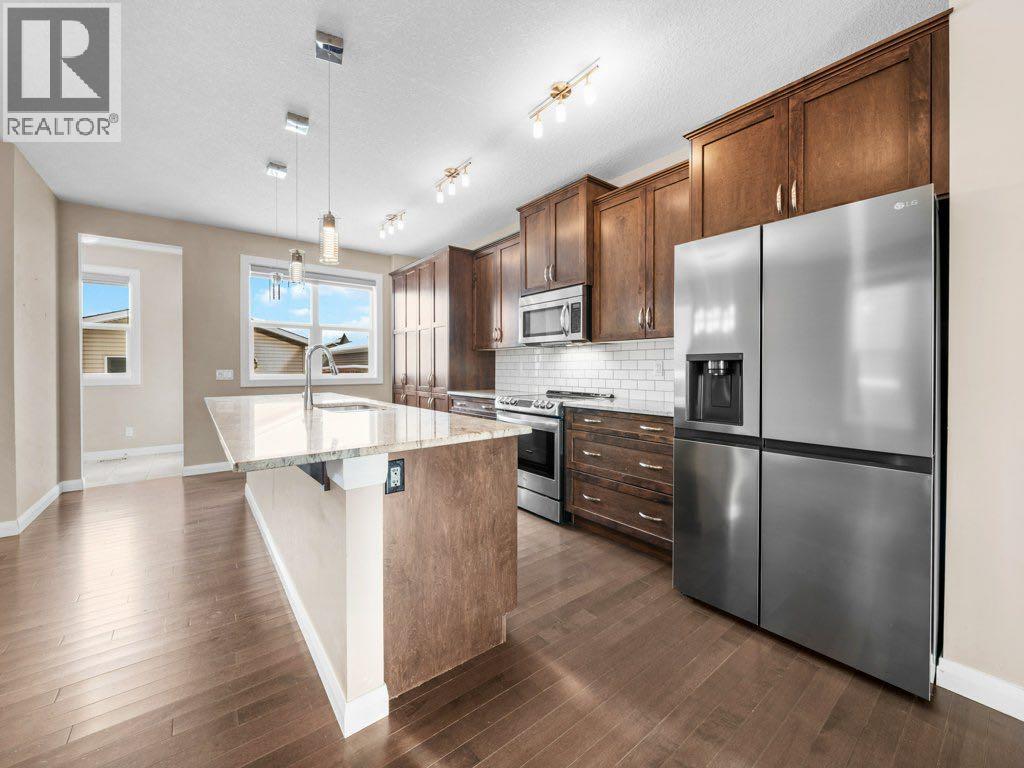 1023 Evanston Drive Nw, Calgary, Alberta  T3P 0K4 - Photo 3 - A2270907