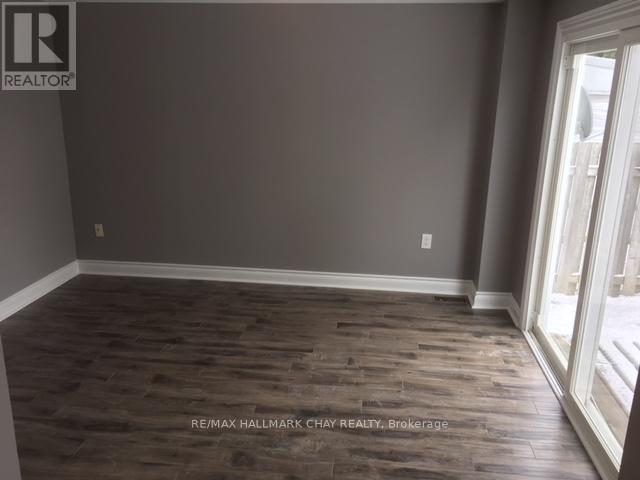 61 Corbett Drive, Barrie, Ontario  L4M 5V6 - Photo 2 - S12653458