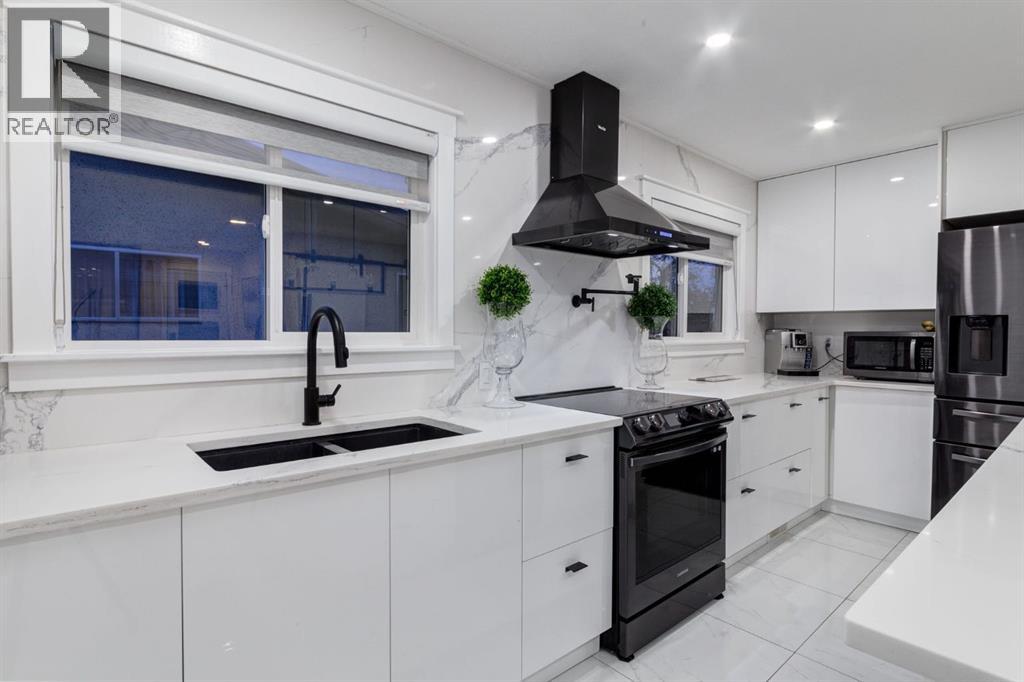 5 Sydney Drive Sw, Calgary, Alberta  T2W 0S7 - Photo 10 - A2269400