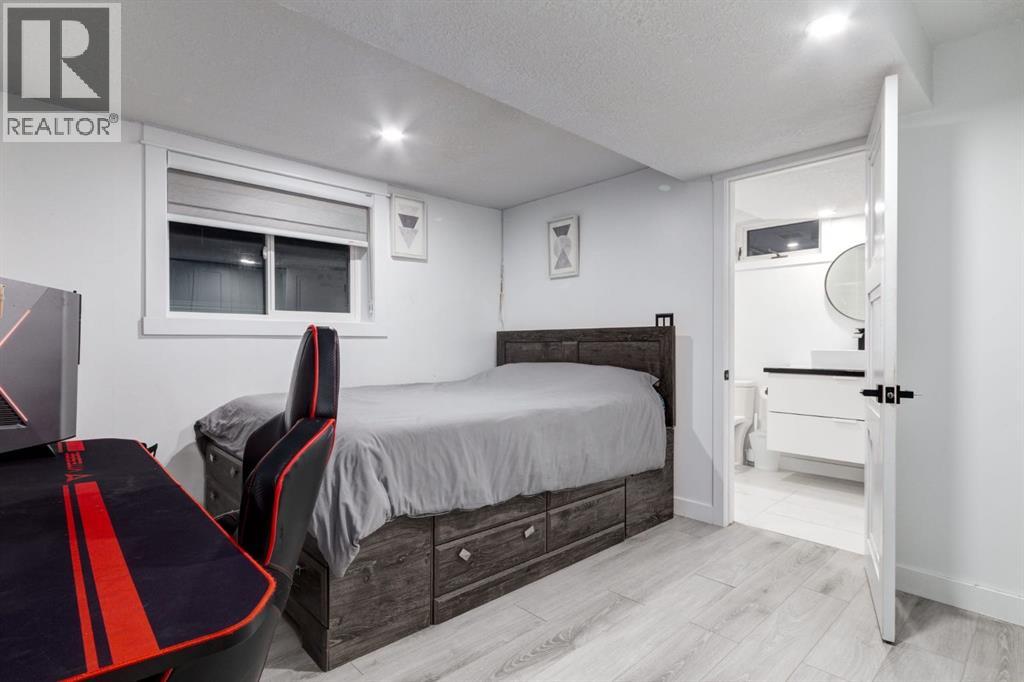 5 Sydney Drive Sw, Calgary, Alberta  T2W 0S7 - Photo 23 - A2269400