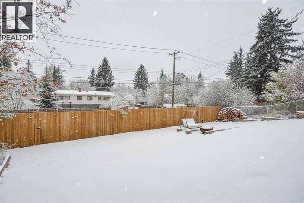 5 Sydney Drive Sw, Calgary, Alberta  T2W 0S7 - Photo 3 - A2269400
