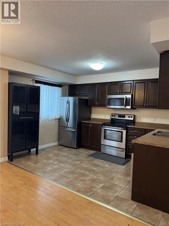 55 Mooregate Crescent Unit# 9, Kitchener, Ontario  N2M 0A6 - Photo 4 - 40795244