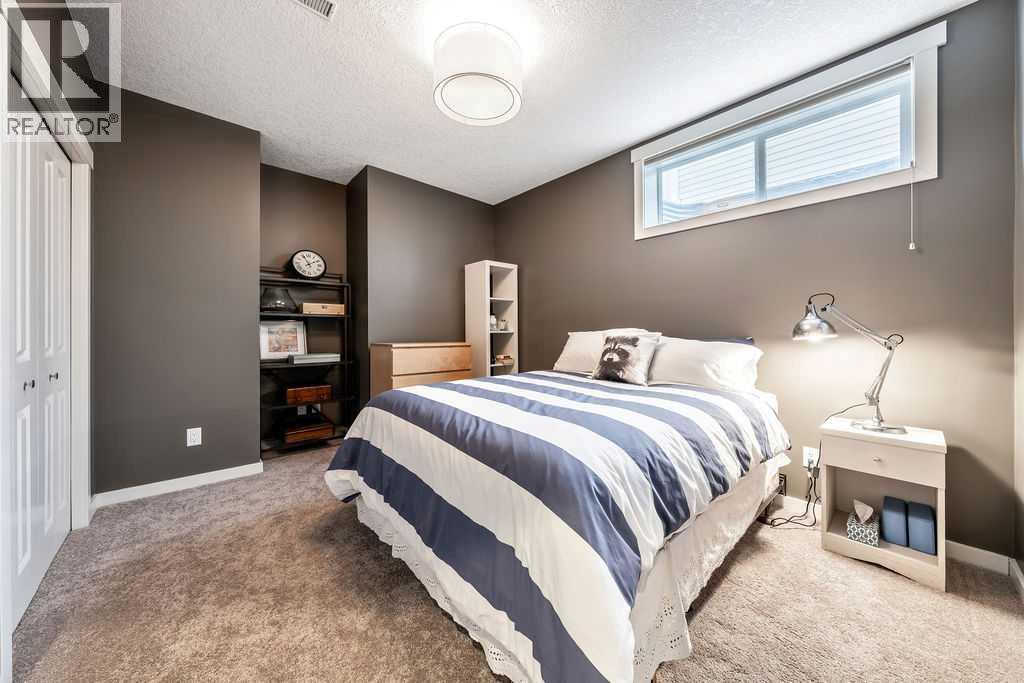 78 Ypres Green Sw, Calgary, Alberta  T2T 6M1 - Photo 28 - A2272935