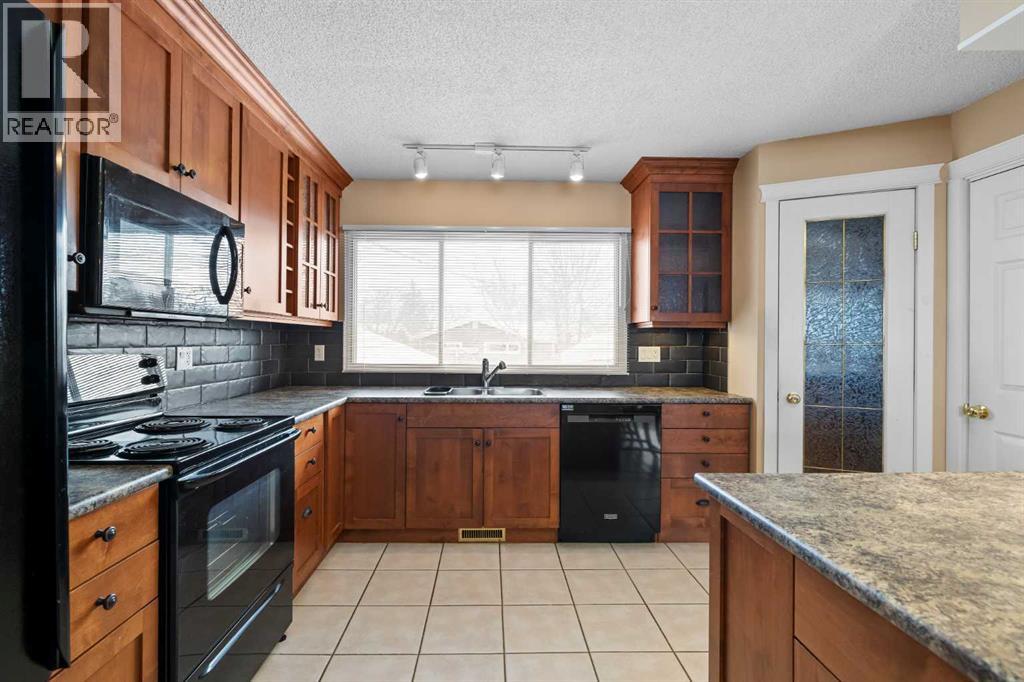 10727 Mapleglen Crescent Se, Calgary, Alberta  T2J 1X1 - Photo 16 - A2273607