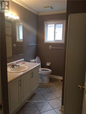 42 Heathwood Drive, Brampton, Ontario  L7A 1Y4 - Photo 5 - W12653564