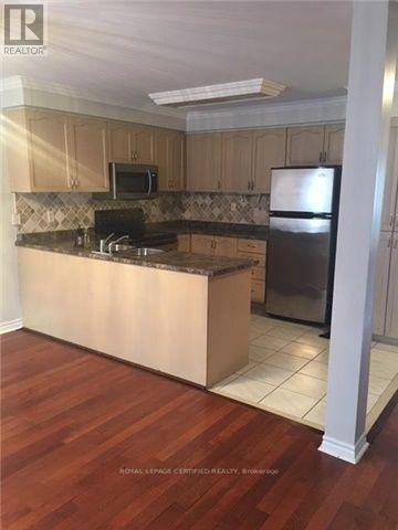 42 Heathwood Drive, Brampton, Ontario  L7A 1Y4 - Photo 6 - W12653564