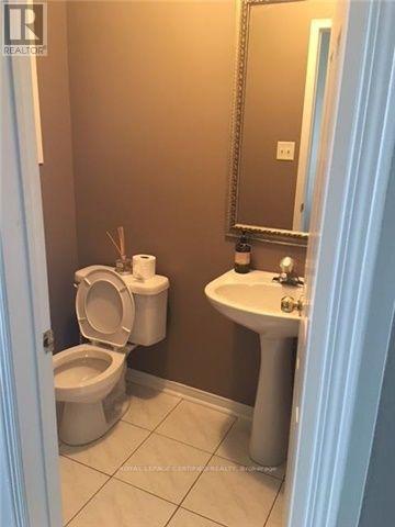 42 Heathwood Drive, Brampton, Ontario  L7A 1Y4 - Photo 8 - W12653564