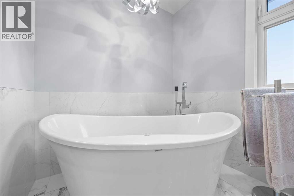 827 Canaveral Crescent Sw, Calgary, Alberta  T2W 1N3 - Photo 22 - A2270166