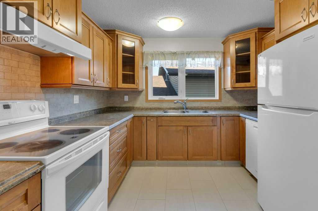 88 Bermondsey Crescent Nw, Calgary, Alberta  T3K 1W2 - Photo 8 - A2264269