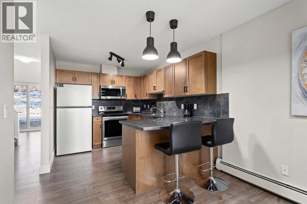 8, 301 Village Mews Sw, Calgary, Alberta  T3H 2L3 - Photo 8 - A2248553
