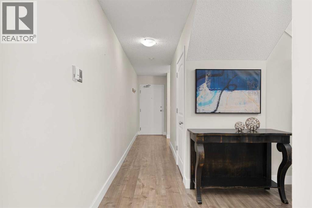 8, 301 Village Mews Sw, Calgary, Alberta  T3H 2L3 - Photo 4 - A2248553