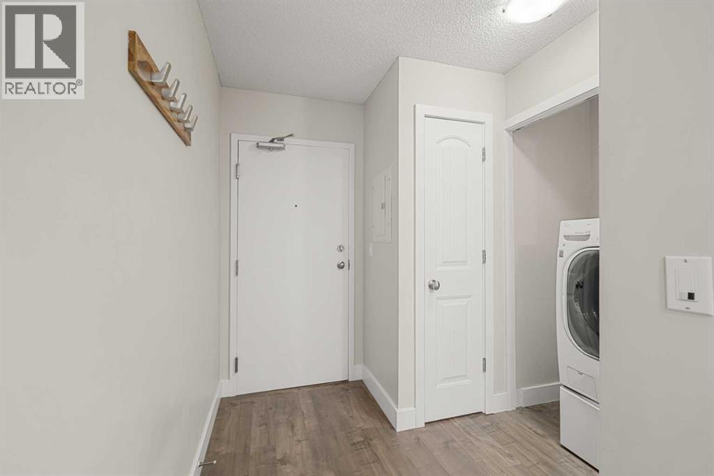 8, 301 Village Mews Sw, Calgary, Alberta  T3H 2L3 - Photo 5 - A2248553