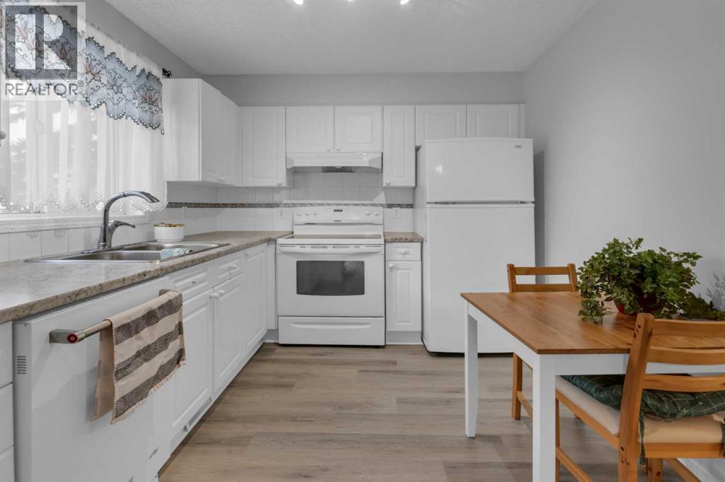 227 Harvest Gold Place Ne, Calgary, Alberta  T3K 4Y1 - Photo 7 - A2276378