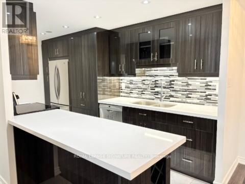 2007 - 812 Burnhamthorpe Road, Toronto, Ontario  M9C 4W1 - Photo 2 - W12654280