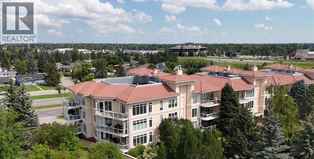 101, 505 Canyon Meadows Drive Sw, Calgary, Alberta  T2W 5E9 - Photo 1 - A2261461