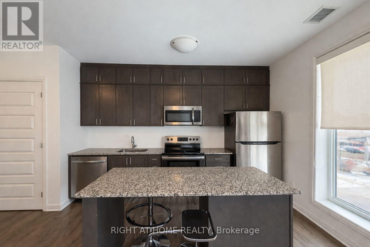 306 - 50 Kaitting Trail, Oakville, Ontario  L6M 5N3 - Photo 4 - W12654326