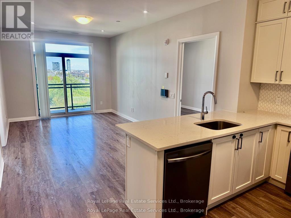 511 - 95 Dundas Street W, Oakville, Ontario  L6M 5N4 - Photo 3 - W12654816