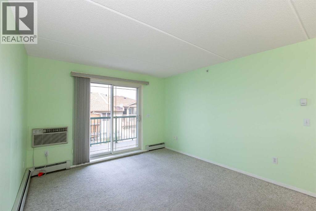 205, 4319 49 Street, Innisfail, Alberta T4G 1B6 - Photo 15 - A2255239