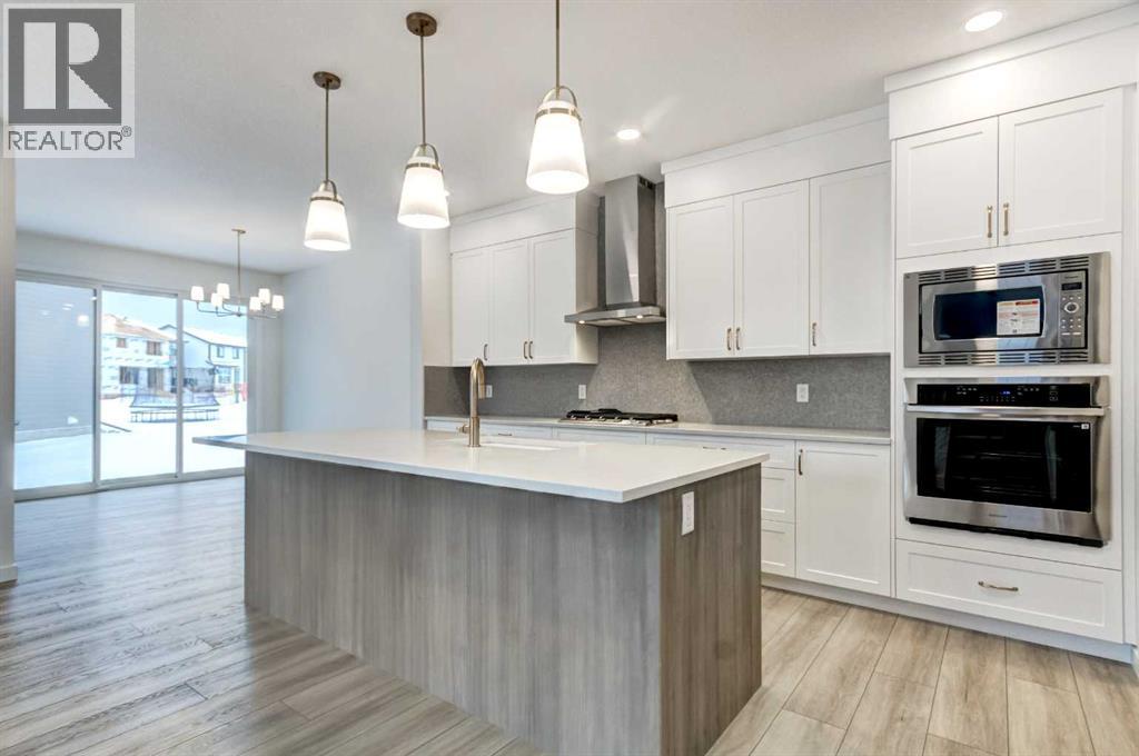 9 Magnolia Path Se, Calgary, Alberta  T3M 3T4 - Photo 7 - A2273281